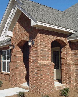 Brick patterns and arches add permanent features.